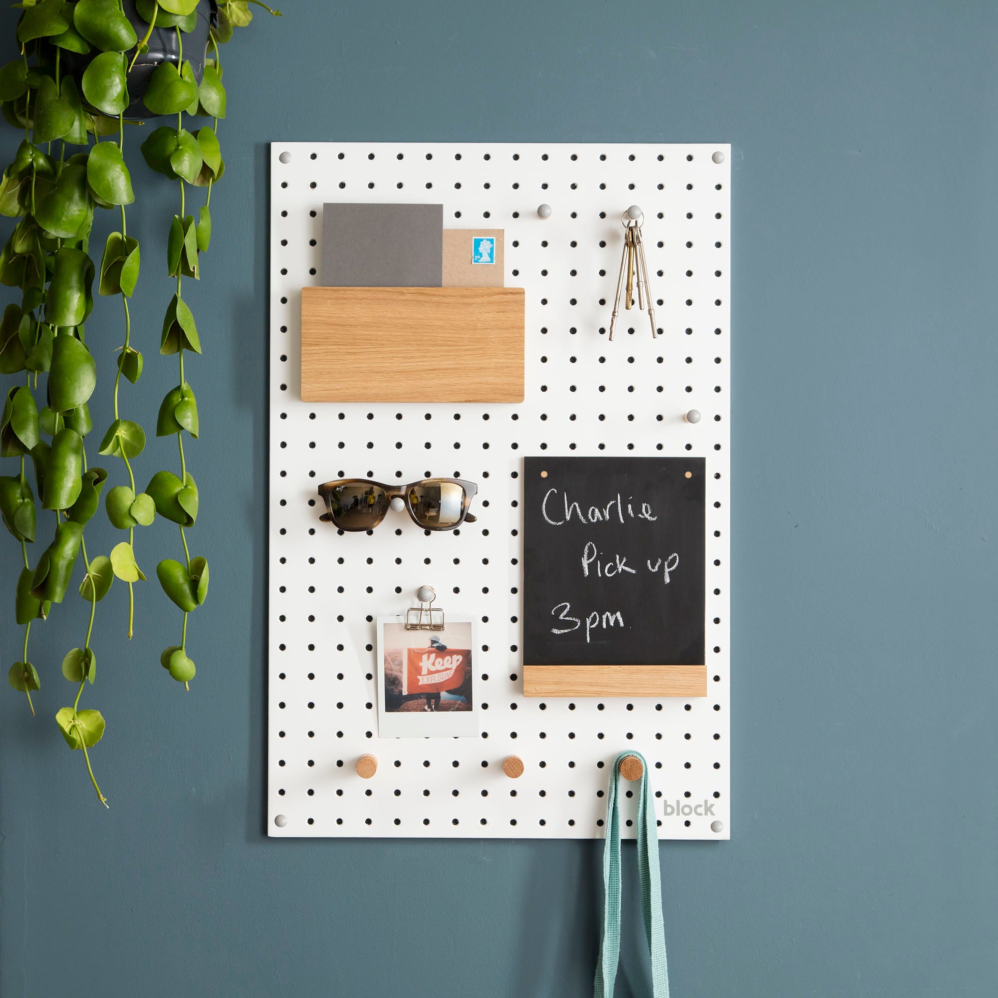 Medium white pegboard display for hallway entrance