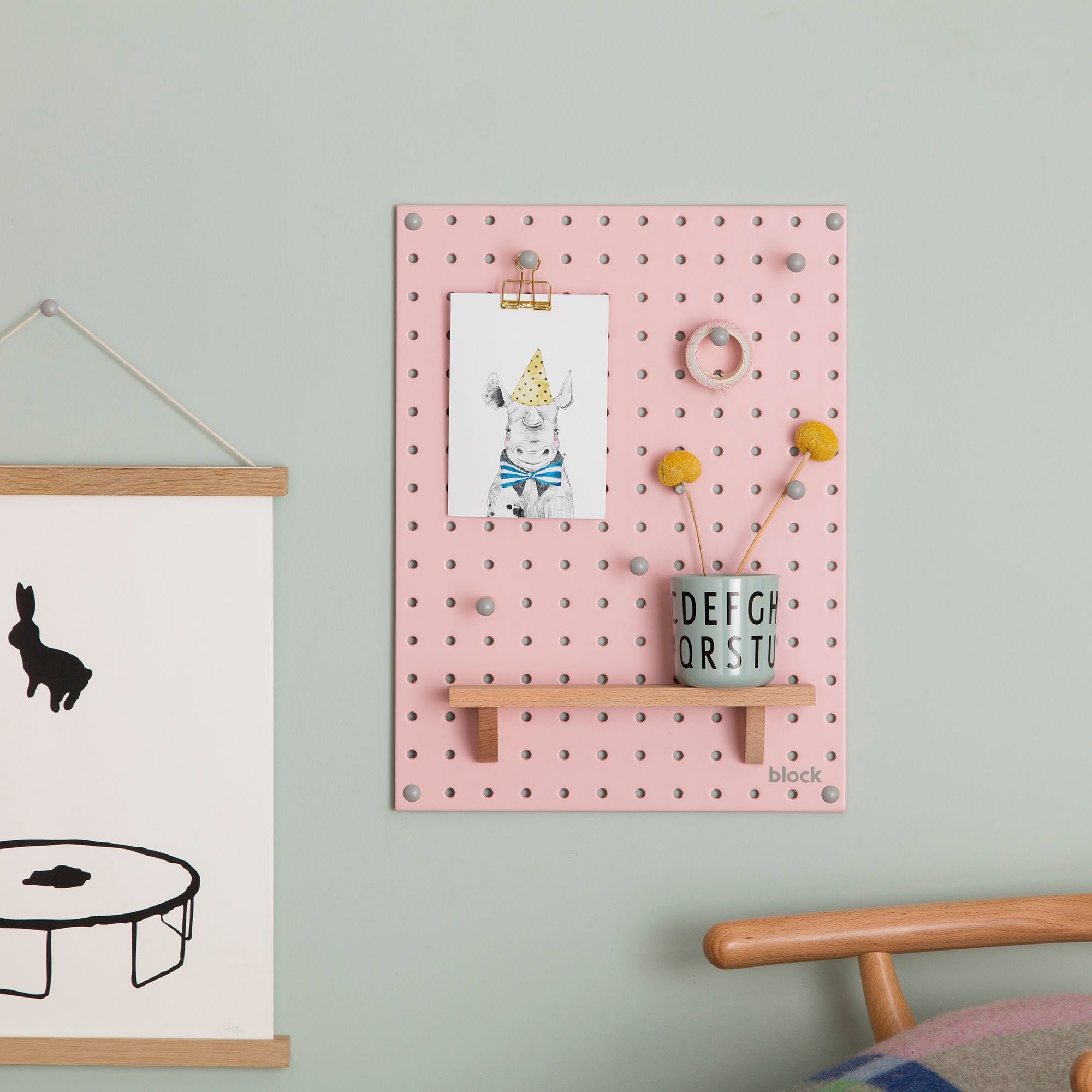 small pink display pegboard for children's room