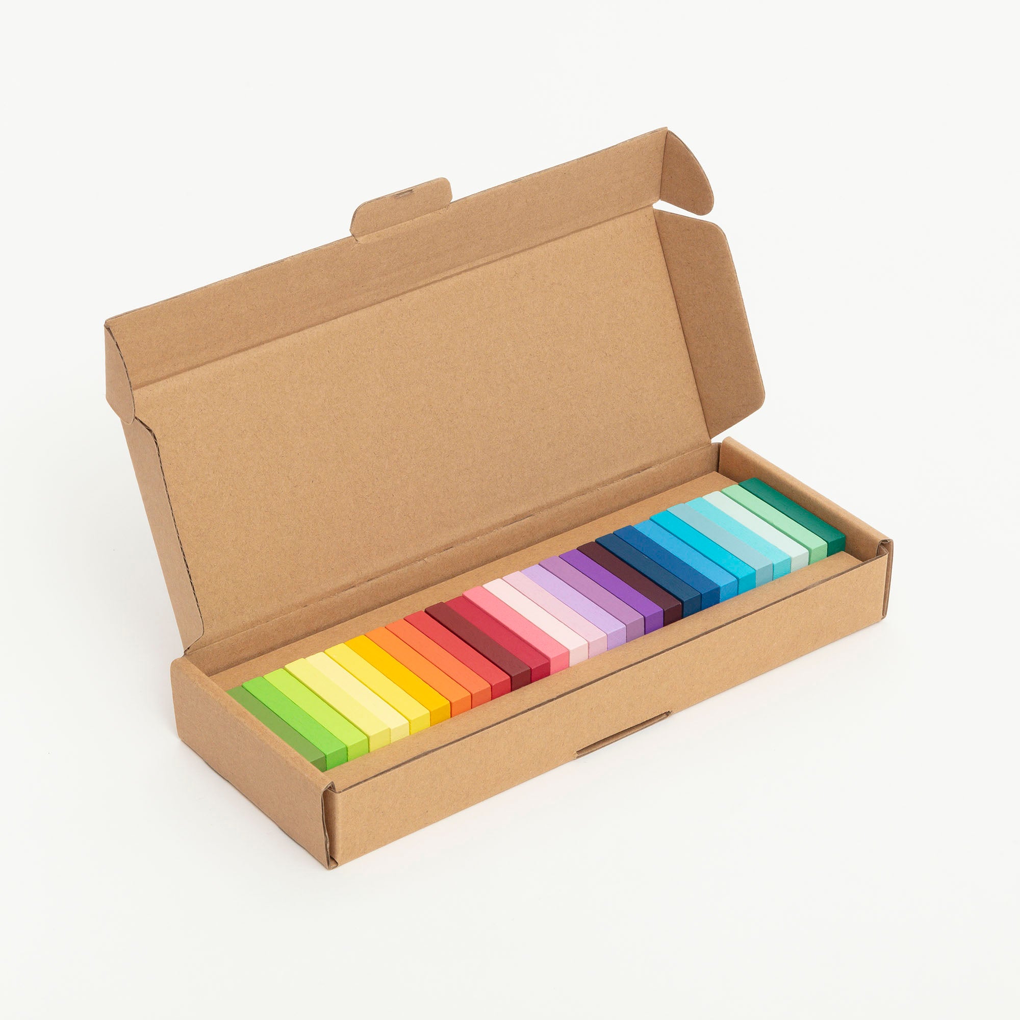 dominoes in a rainbow gradient gift boxed