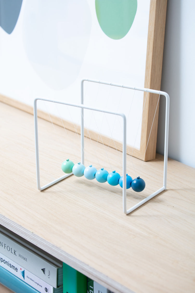 Gradient Newton's Cradle