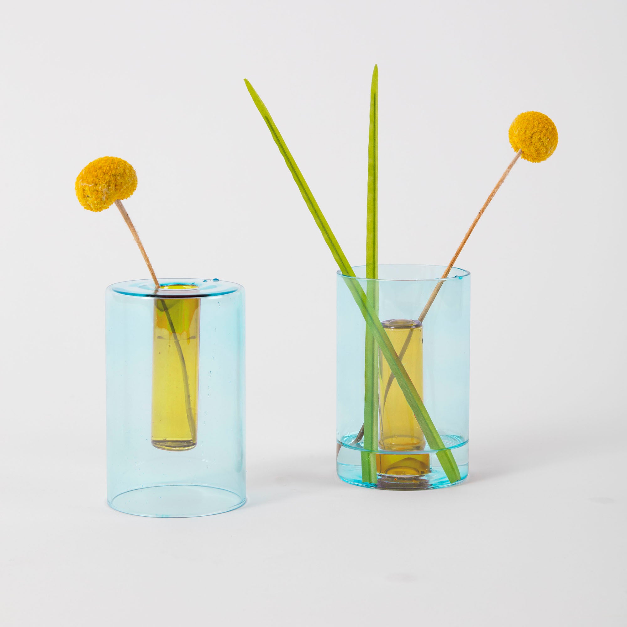 small blue and yellow vase with reversible use for flowers