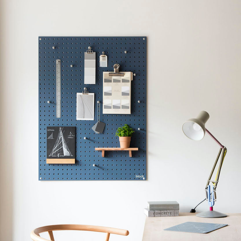 wall mounted blue pegboard and wooden pegboard accessories