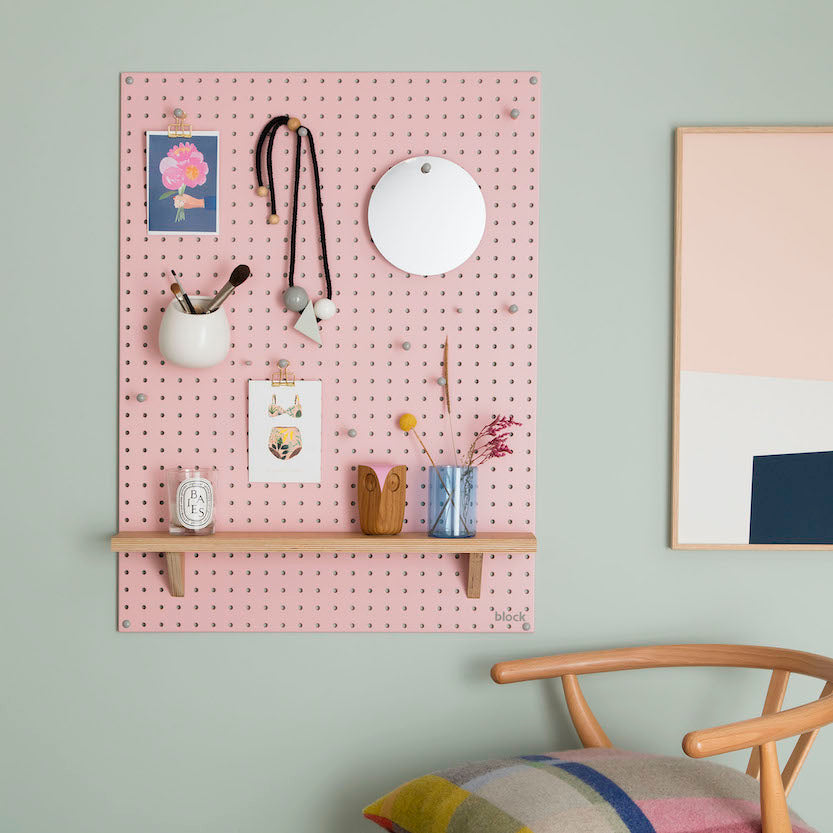 wall mounted pink pegboard and wooden pegboard accessories