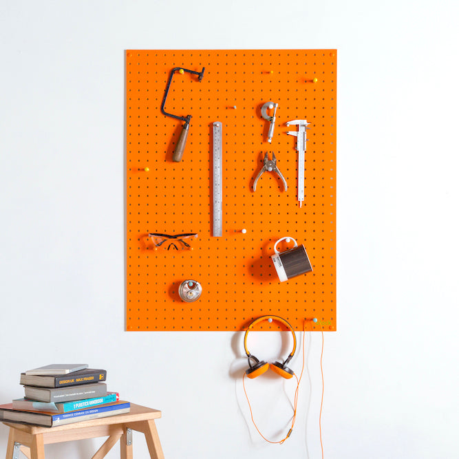 wall mounted orange pegboard and wooden pegboard accessories