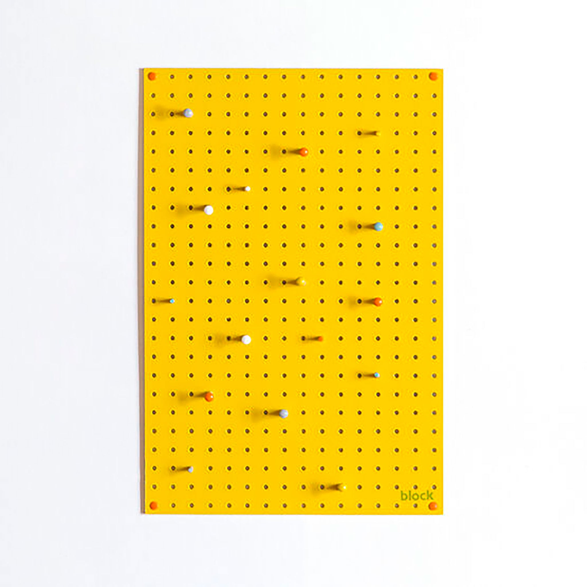 medium yellow pegboard and wooden pegs